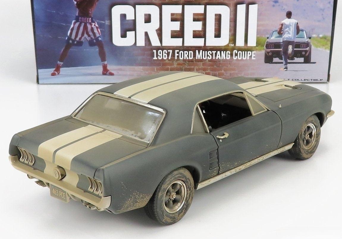 Greenlight - Creed II - Adonis Creed's 1967 Ford Mustang Coupe - Matte Black - White Stripes (Weathered) 1:18 - Artexio