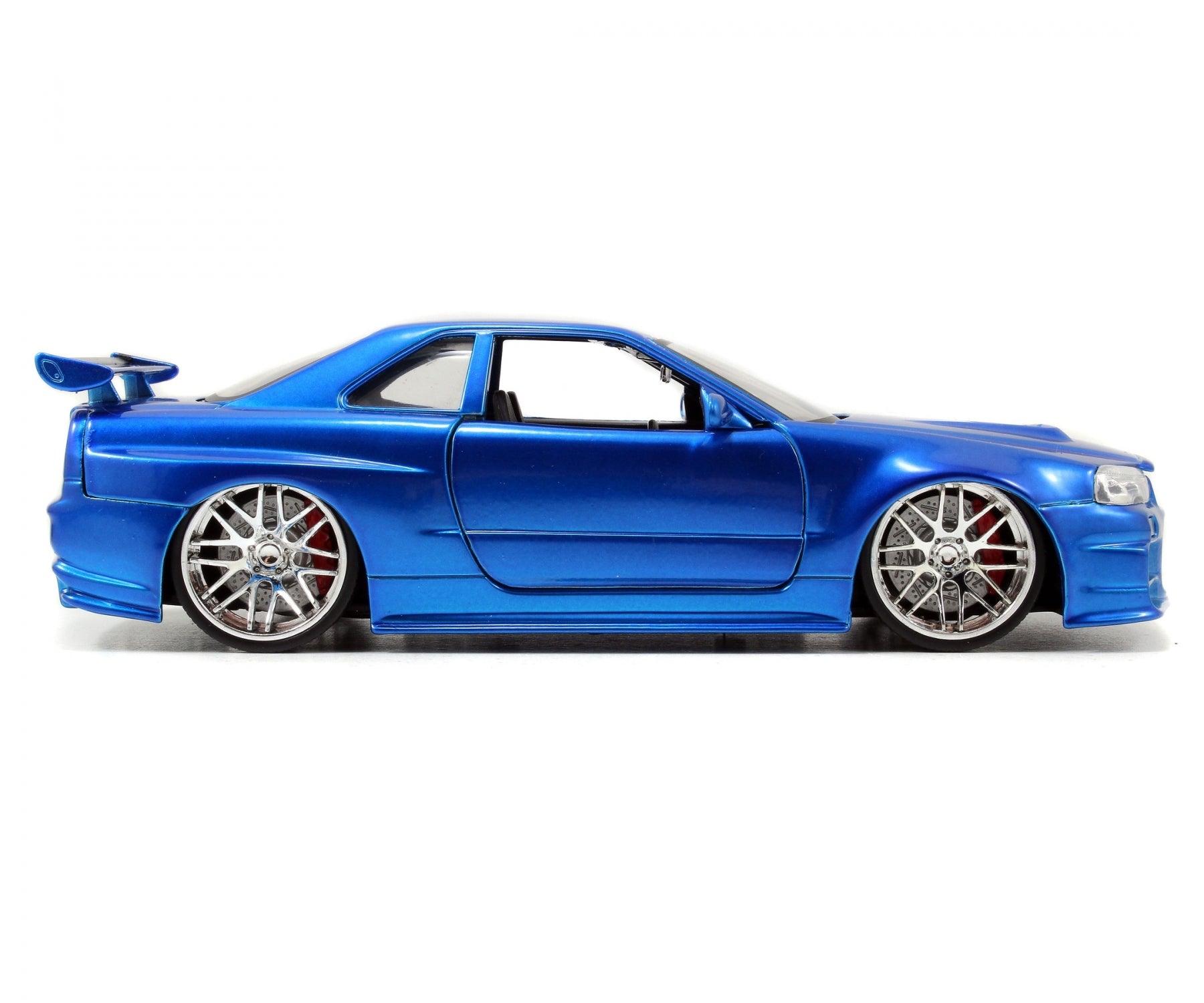 Jadatoys Brian's Nissan Skyline GT - R (R34) 2002 Blue - Fast & Furious 1:24 Modell - Artexio