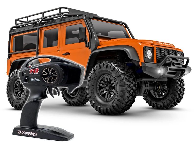 Traxxas TRX-4M Land Rover Defender 1:18 RTR 4WD Mini RC Crawler orange Brushed mit Akku/Lader